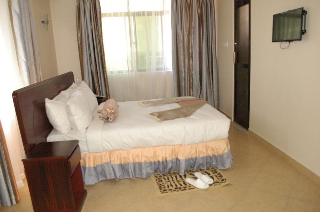 Grace Land Hotel Arusha Quarto foto