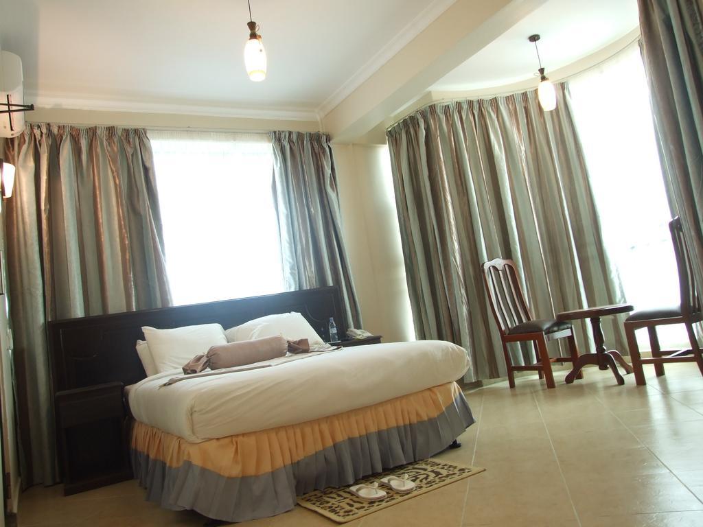 Grace Land Hotel Arusha Quarto foto