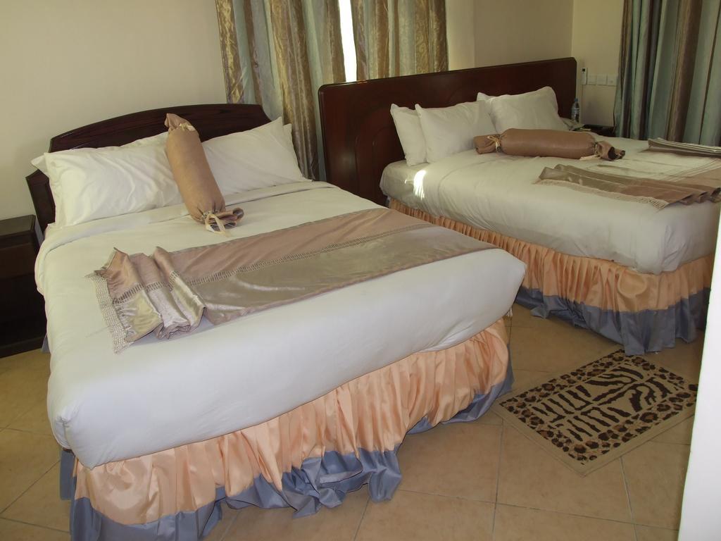 Grace Land Hotel Arusha Quarto foto